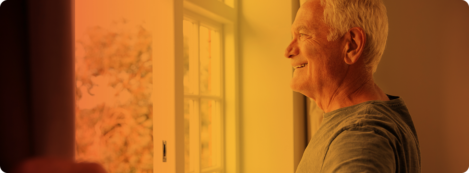 Man looking out of window